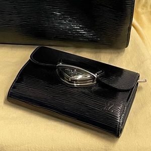 LOUIS VUITTON
Epi Leather Eugenie Wallet